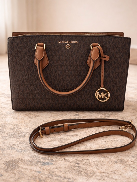Michael Kors Handbags - Michael Kors Brown Logo Satchel with Tan Trim and Gold Charm